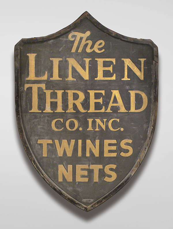 Advertising Sign for the Linen Thread Co. Inc., c.1940s, wood, metal, paint. Cape Ann Museum, Gloucester, MA. Gift of Steven Kaity, 2004 [#2004.20].