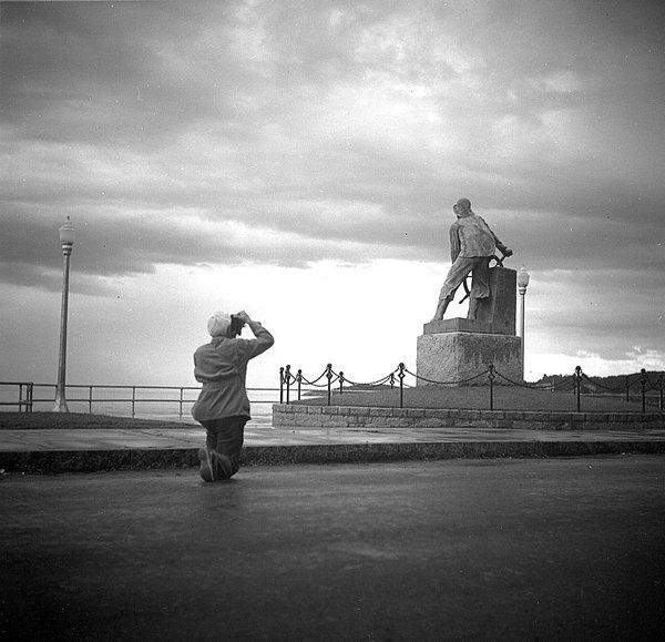Leonard Craske Photographing His Statue, "Man at the Wheel," on the Boulevard, Gloucester, MA